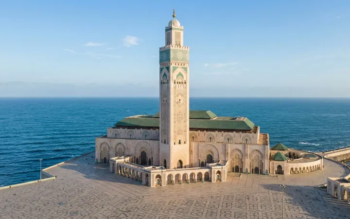 Hassan II Mosque in Casablanca by the Atlantic Ocean at sunset
