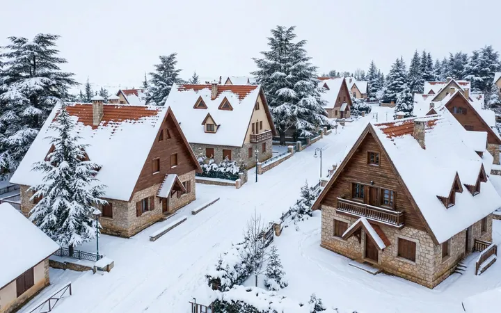 Steep-roofed chalets of Ifrane covered in snow in the heart of the Middle Atlas